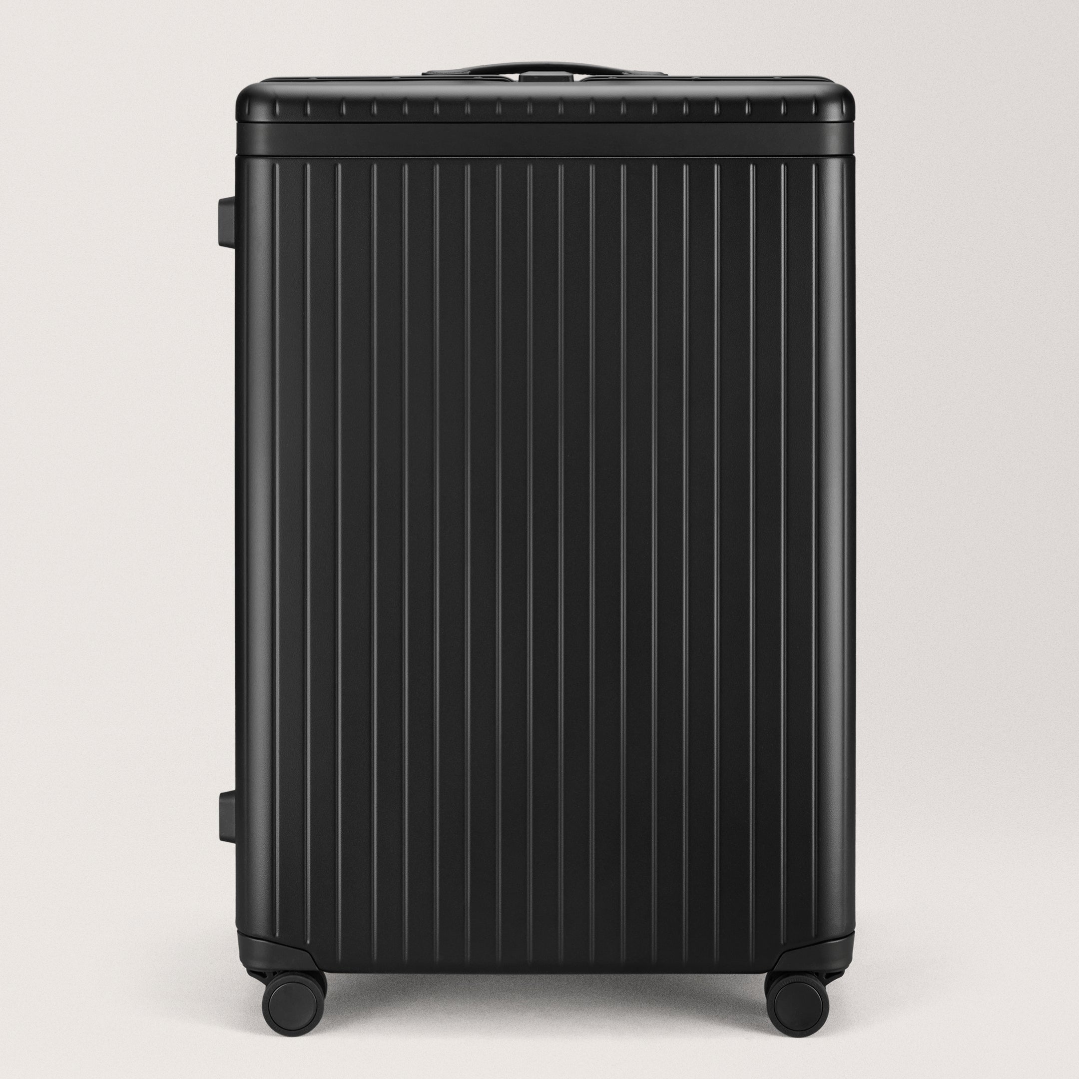 The Large Check-in Black / Black Extra-large hard-shell suitcase