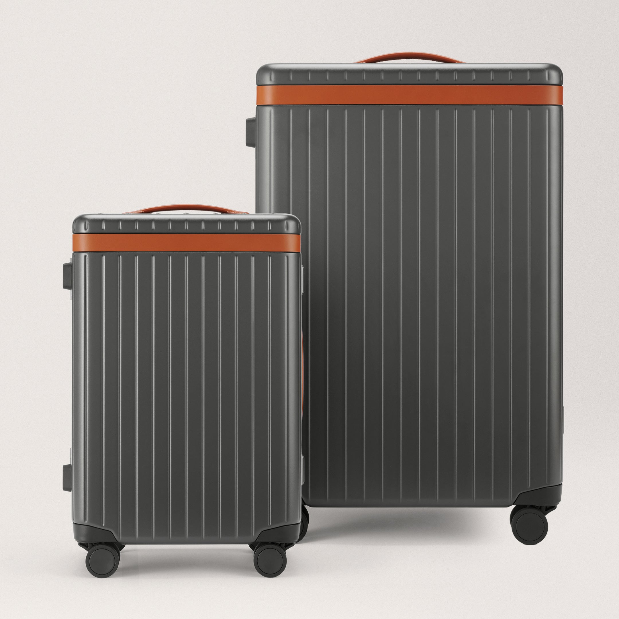 The Luggage Set Carry-on / Check-in / Grey / Cognac Hard-shell luggage set