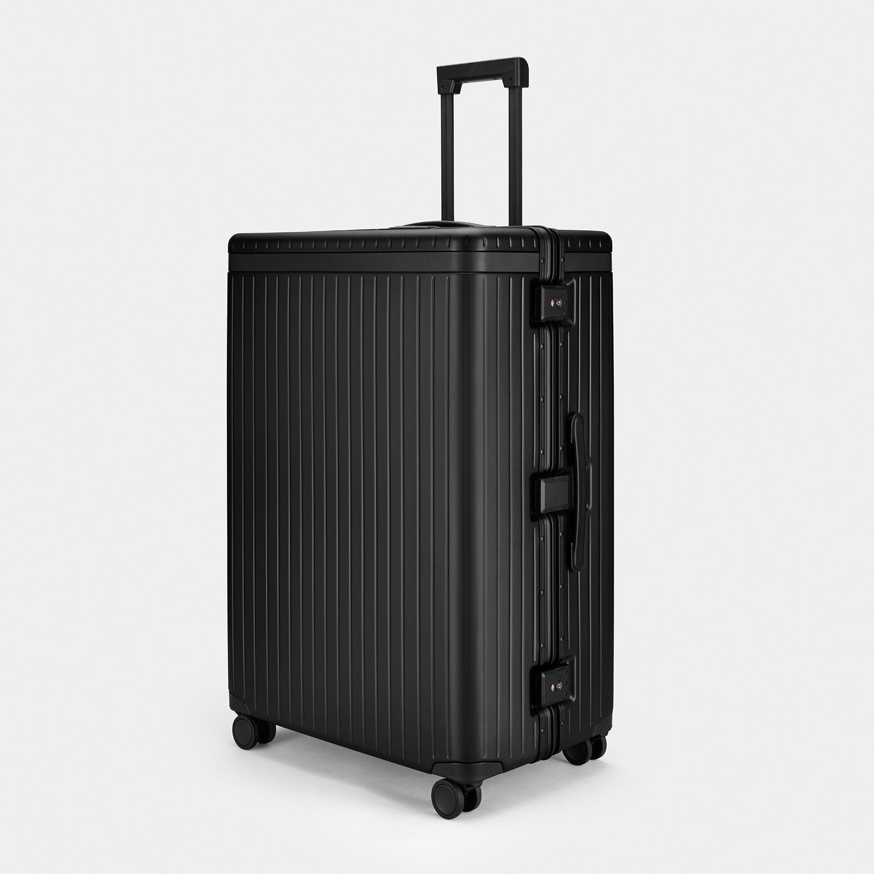 The Large Check-in - Return Black / Black / Smooth Extra-large hard-shell suitcase
