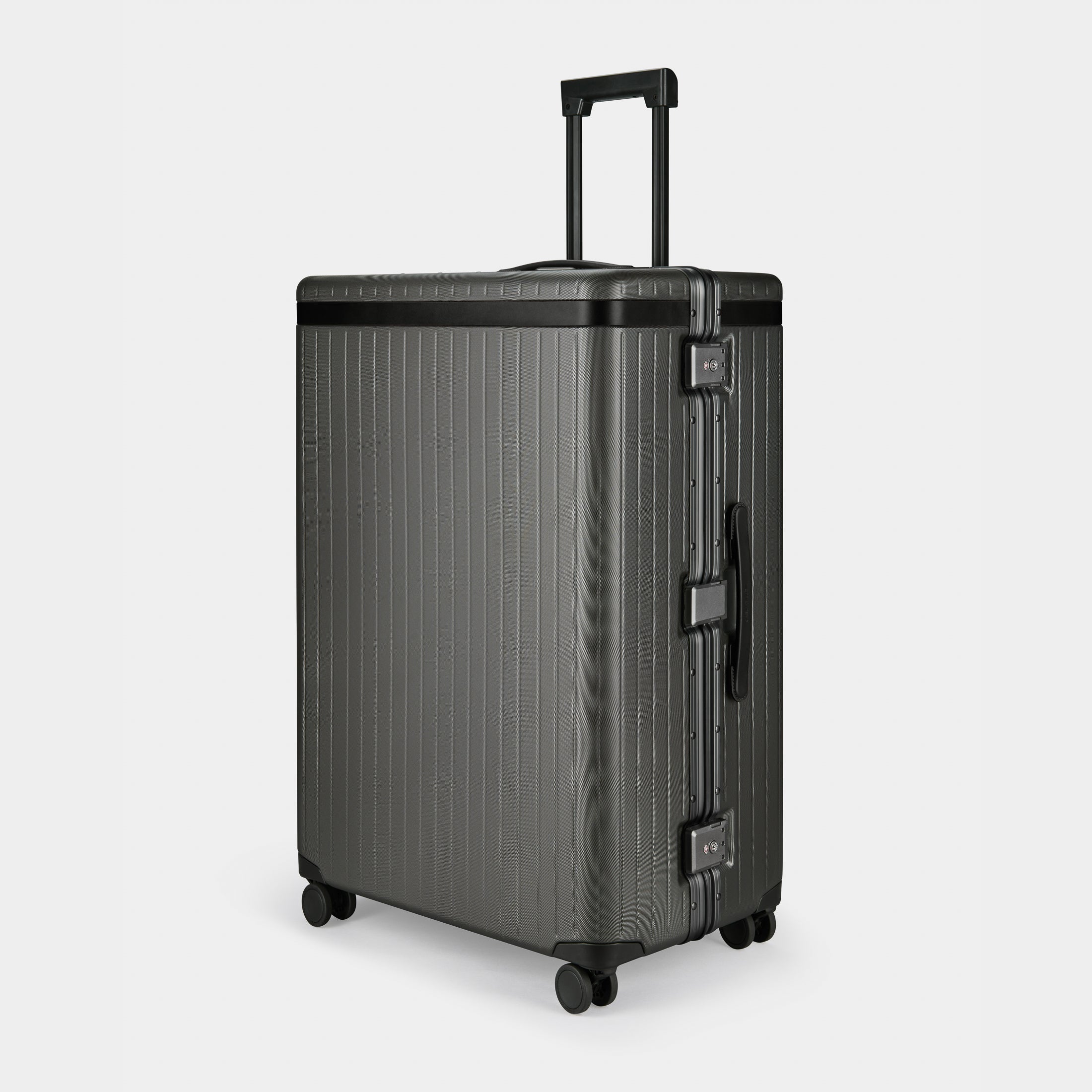 The Large Check-in - Return Grey / Black / Dotted Extra-large hard-shell suitcase