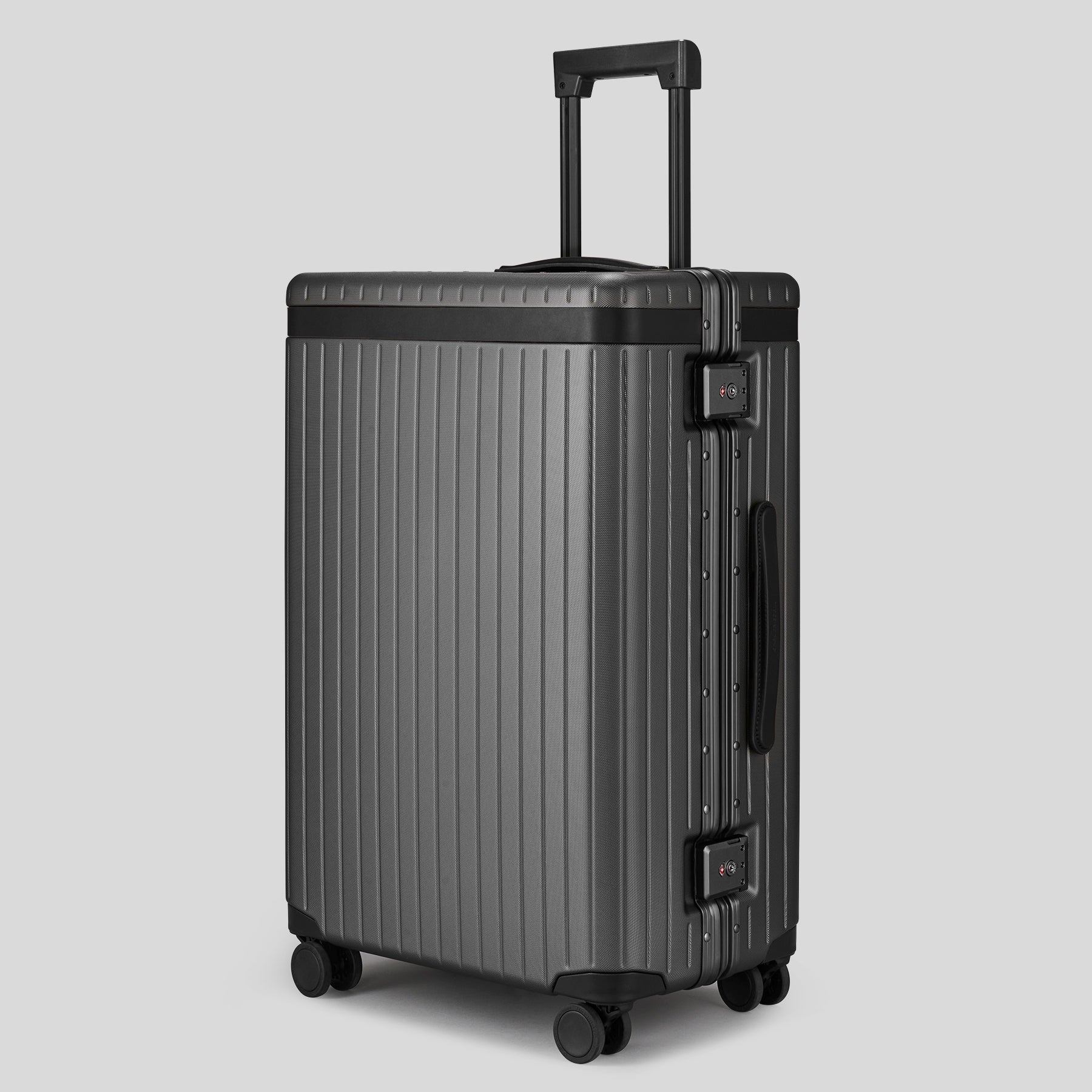 The Check-in - Return Grey / Black / Dotted Large grey polycarbonate suitcase - Fair Condition